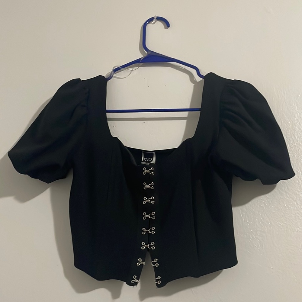 Black clip-up crop top.